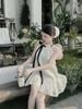 Váy yếm babydoll hoa đục lỗ đính nơ xinh xĩu - H119 - HÀNG SALE LỖ KO ĐỔI TRẢ DƯỚI MỌI HÌNH THỨC