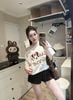 Set 2 món áo lệch vai mickey mix quần short da beo - TRẮNG - H203