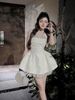 Đầm yếm cúp ngực đính nơ chiết eo bồng xòe siêu hot - T51 (EO S<68, M<72)