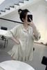 Đầm babydoll dáng ngắn túi hộp viền bèo họa tiết kẻ sọc - T462
