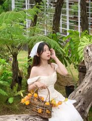 SET ÁO TAY RỚT HOA NỔI ĐAN DÂY NƠ KÈM CHÂN VÁY MAXI 4 TẦNG