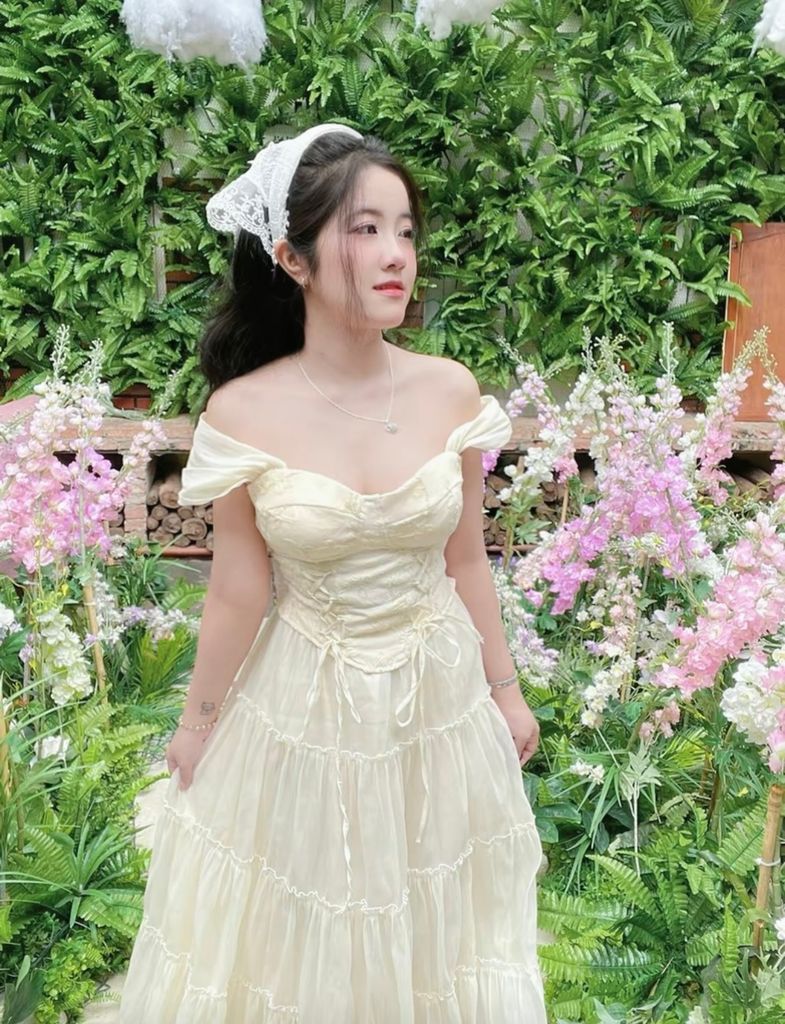 SET ÁO TAY RỚT HOA NỔI ĐAN DÂY NƠ KÈM CHÂN VÁY MAXI 4 TẦNG