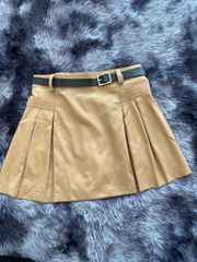 CHÂN VÁY XÒE A THÔ MỀM DÁNG NGẮN TÚI TRƯỚC KÈM ĐAI