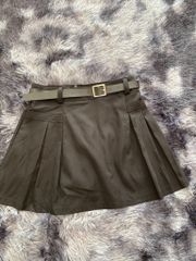 CHÂN VÁY XÒE A THÔ MỀM DÁNG NGẮN TÚI TRƯỚC KÈM ĐAI