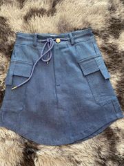 CHÂN VÁY JEAN NGẮN VẠT BẦU TÚI HỘP