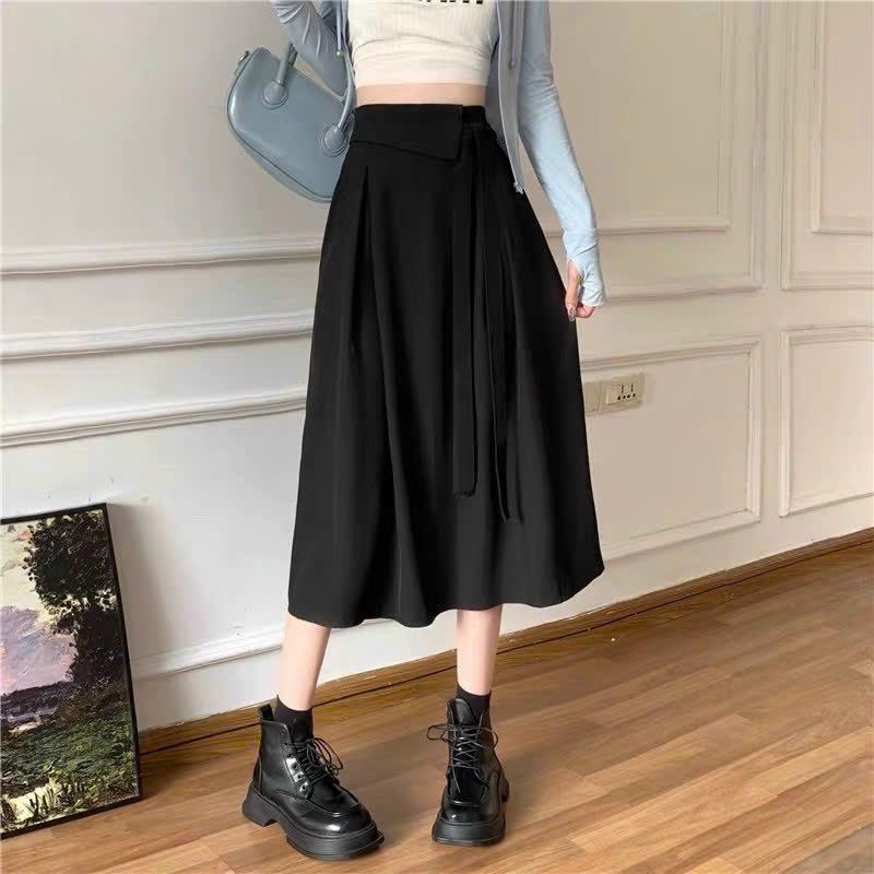 CHÂN VÁY XẾP LY A DÁNG DÀI CỘT NƠ LỆCH