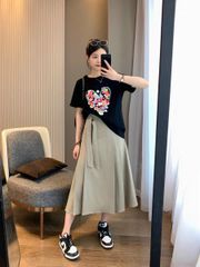 CHÂN VÁY XẾP LY A DÁNG DÀI CỘT NƠ LỆCH