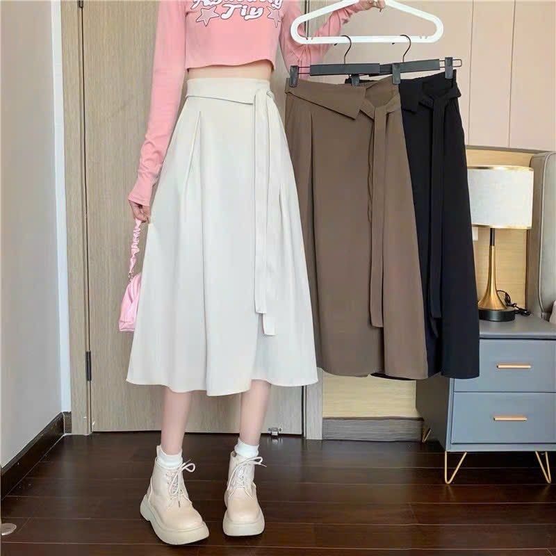 CHÂN VÁY XẾP LY A DÁNG DÀI CỘT NƠ LỆCH