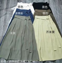 CHÂN VÁY XẾP LY A DÁNG DÀI CỘT NƠ LỆCH