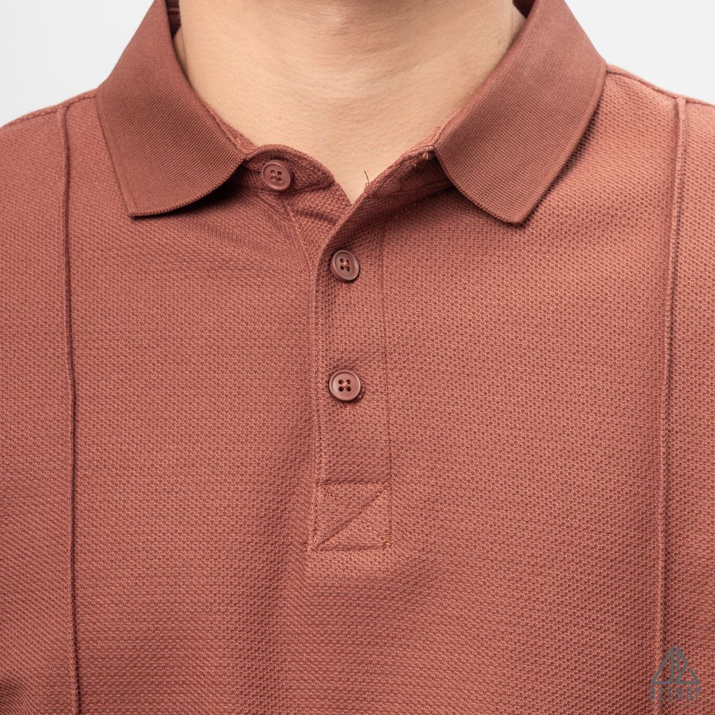 Áo polo may viền nổi vải dệt gân