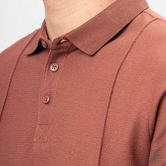 Áo polo may viền nổi vải dệt gân