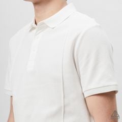 Áo polo may viền nổi vải dệt gân