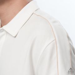 Polo form rộng phối viền vai kem