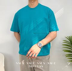 Áo thun vải gân sọc phối túi