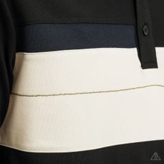Áo polo đắp ngực kem đen thêu chữ STRENGHT
