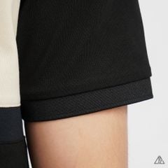 Áo polo đắp ngực kem đen thêu chữ STRENGHT