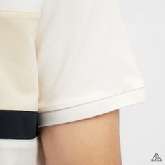 Áo polo đắp ngực kem đen thêu chữ STRENGHT