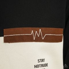 Áo polo phối ngực kem in chữ STAY NOTRUDE NICE