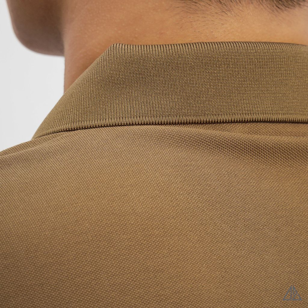 Áo polo phối ngực kem in chữ STAY NOTRUDE NICE