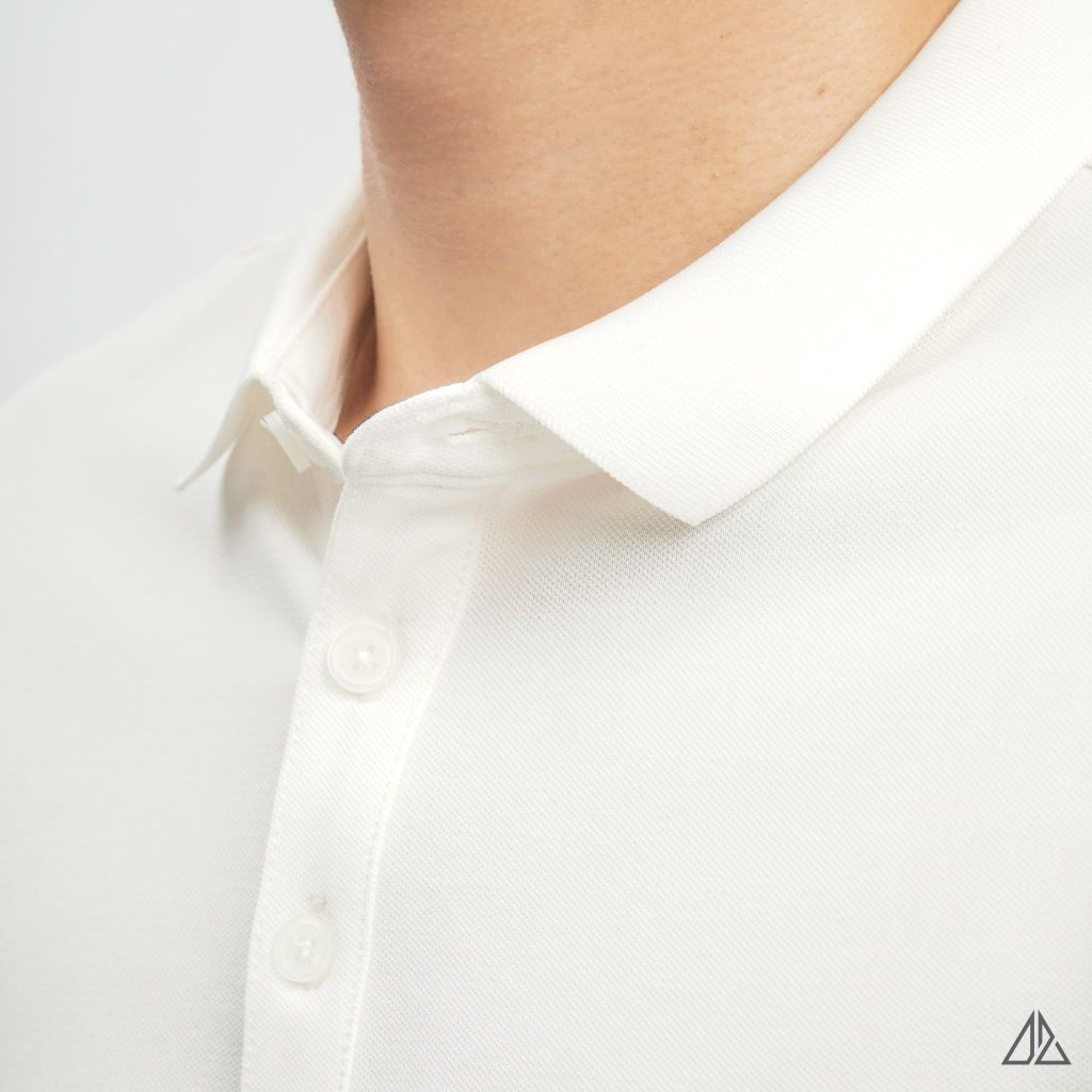 Áo polo phối ngực kem in chữ STAY NOTRUDE NICE