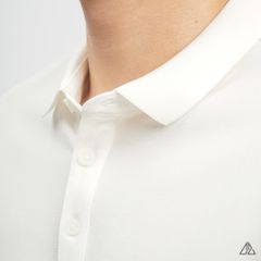 Áo polo phối ngực kem in chữ STAY NOTRUDE NICE