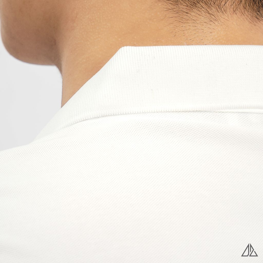 Áo polo phối ngực kem in chữ STAY NOTRUDE NICE