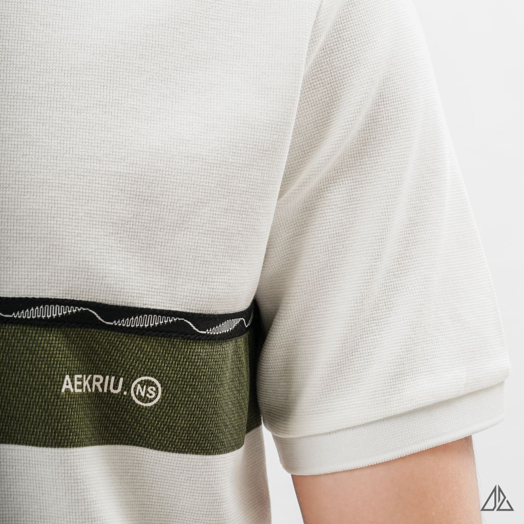 Áo polo phối viền sọc ngực xanh