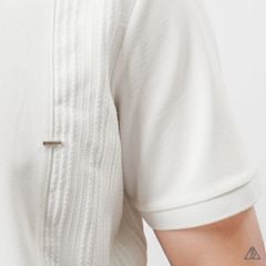 Áo polo phối vải nổi ngực