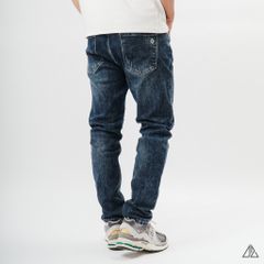 Quần jean xanh dập nổi túi DR