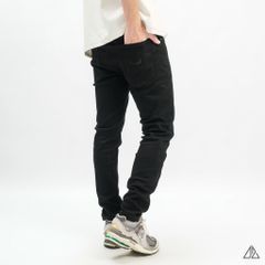 Quần jean đen dập nổi túi sau