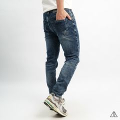 Quần jean xanh wash dập nổi túi DESIGN