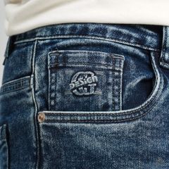 Quần jean xanh wash dập nổi túi DESIGN