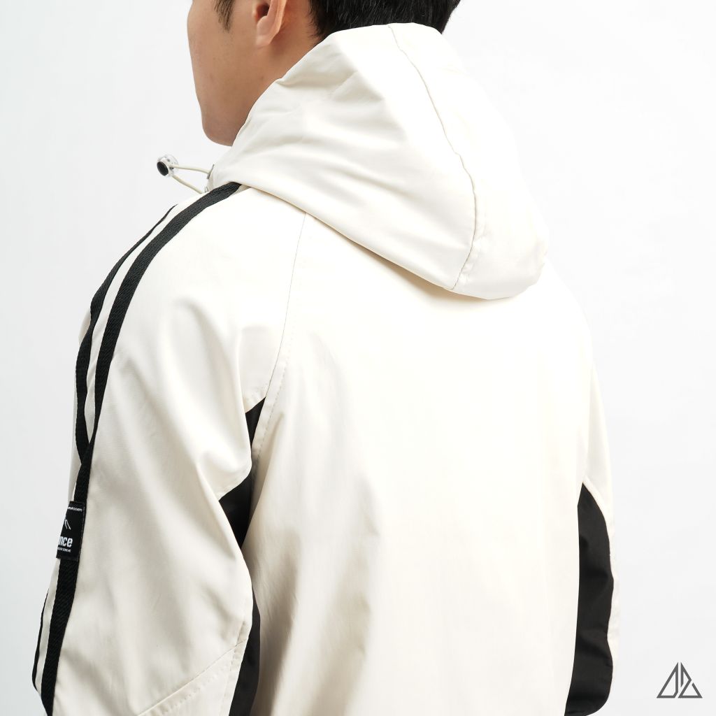 Áo khoác dù nón trùm phối viền tay áo raglan