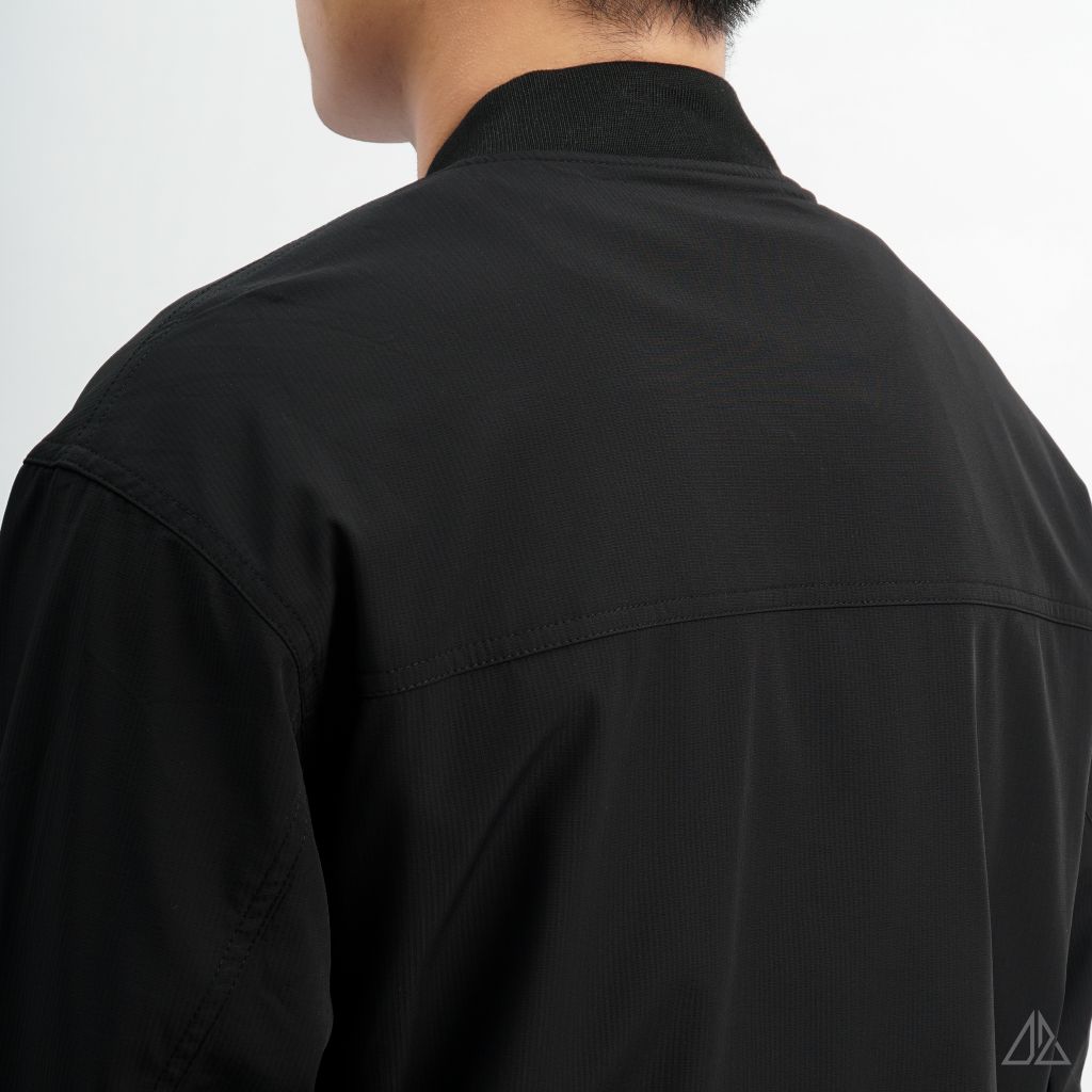 Áo khoác bomber phối túi sọc vải dù