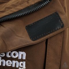 Áo khoác dù nón trùm thêu ngực Paston