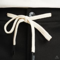Quần short nỉ may ráp