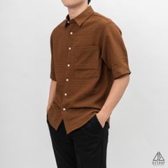 Áo sơ mi tay lững, vải dập nổi
