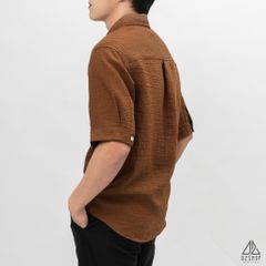 Áo sơ mi tay lững, vải dập nổi