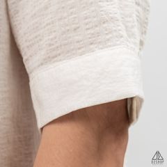Áo sơ mi tay lững, vải dập nổi