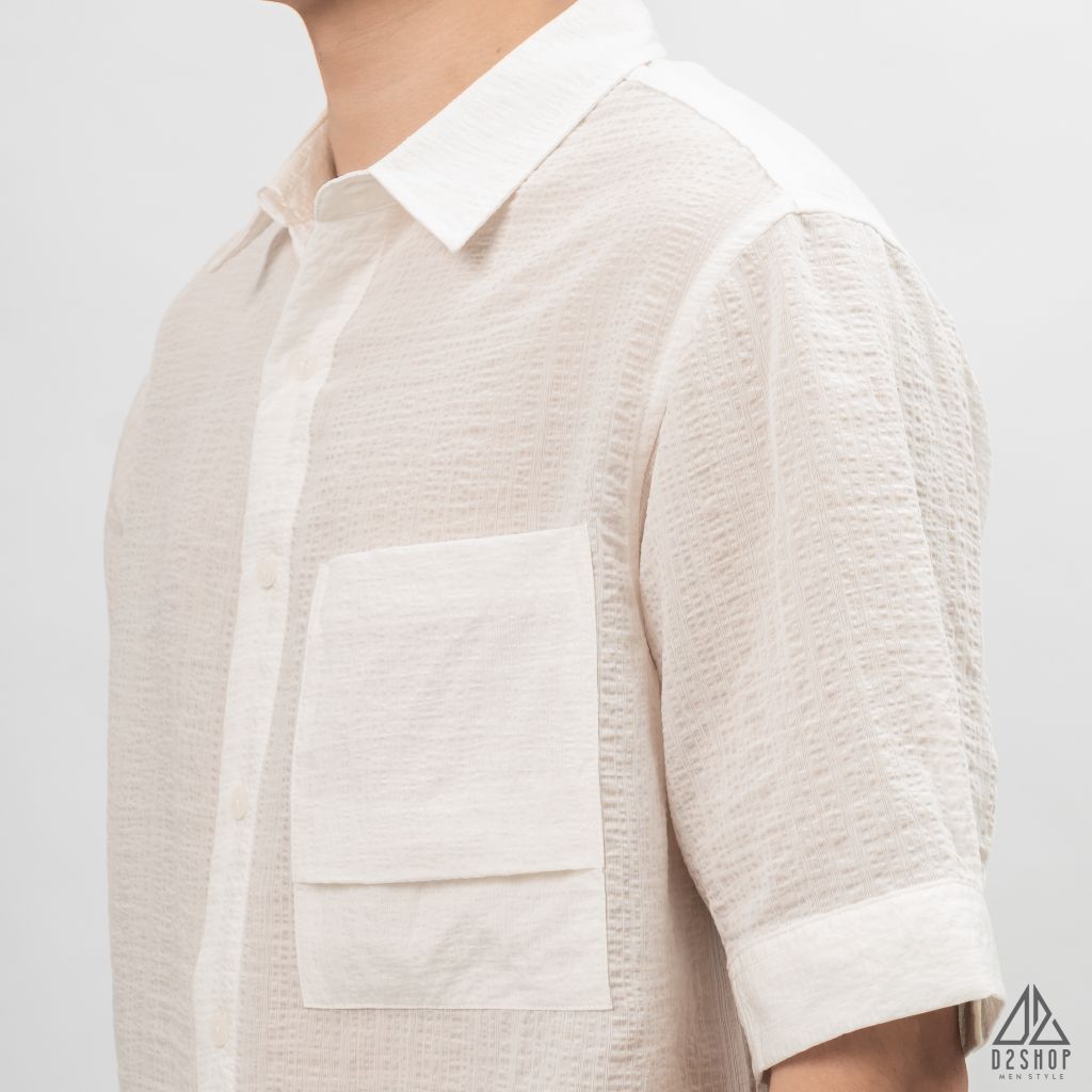 Áo sơ mi tay lững, vải dập nổi