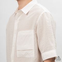 Áo sơ mi tay lững, vải dập nổi