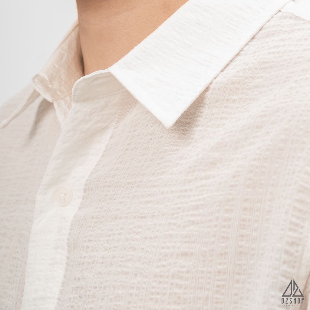 Áo sơ mi tay lững, vải dập nổi