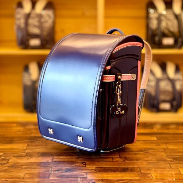 Cặp Randoseru Wonder Shiny Pearl Navy X Metallic Pink