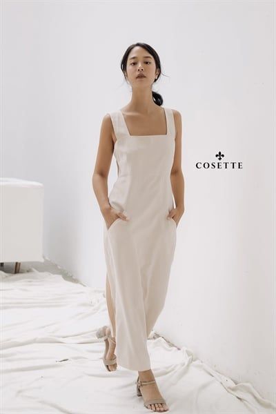  Đầm 2 dây gài nút sau lưng kem 