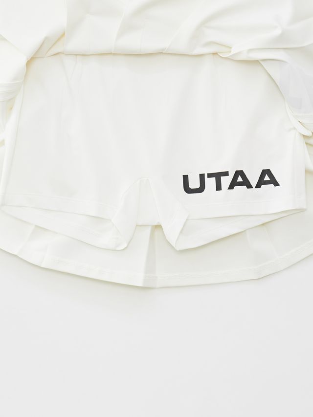 UTAA Slide Bulk Logo Pleats Skirt: White