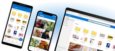 Hai điện thoại di động và màn hình máy tính hiển thị các tệp cũng như ảnh lưu trong OneDrive được sắp xếp theo ngày tháng và câu chuyện.