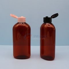 Chai nhựa pet thân oval nâu đỏ 500ml đầu bơm kem nắp bật