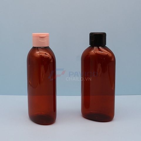 Chai nhựa pet thân oval nâu đỏ 500ml đầu bơm kem nắp bật