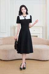 Váy đen dài cổ đắp phối ren trắng đính nơ đá YAME YV666