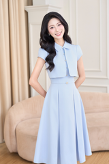 Váy xanh lơ tay ngắn đính cúc đá phối tà crop cách điệu YAME YV686
